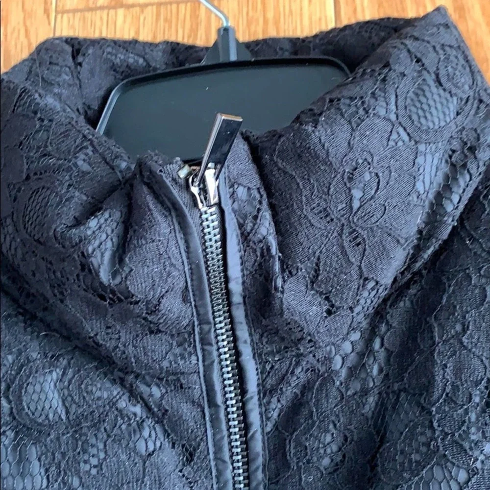 Banana Republic black puffer vest with lace overlay size small